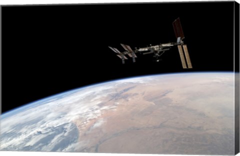 Framed International Space Station Over Earth Print