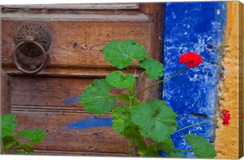 Framed Geraniums and old door in Chania, Crete, Greece Print