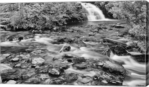 Framed Water Rushing Over Rocks Print