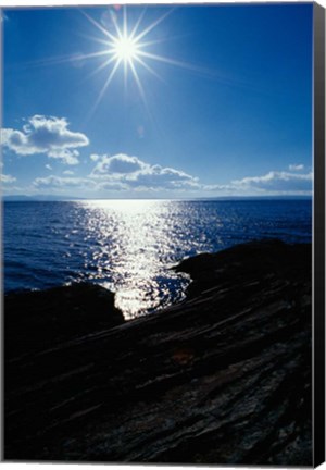 Framed Sunstar Over Yellowstone Lake Print