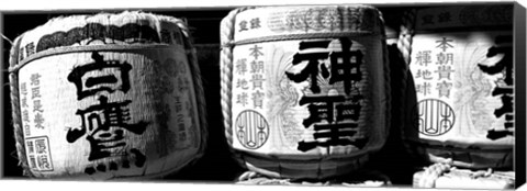 Framed Close-up of three dedicated sake barrels, Imamiya Temple, Kita-ku, Kyoto, Japan Print