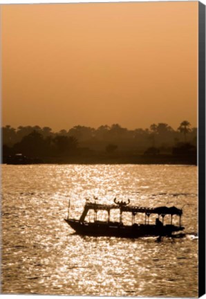 Framed Egypt, Luxor Water taxi at sunset Nile River Print