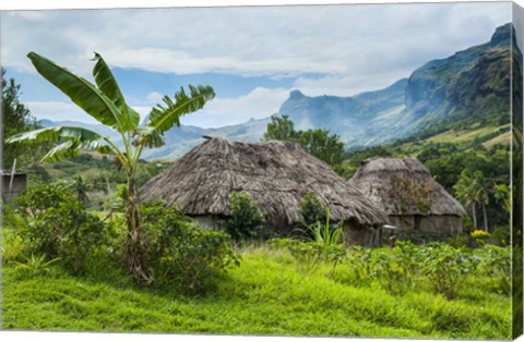 Framed Traditional thatched roofed huts in Navala, Fiji Print