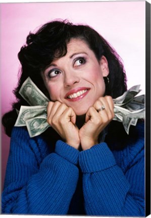 Framed Excited Brunette Woman Holding Several Dollar Bills Print