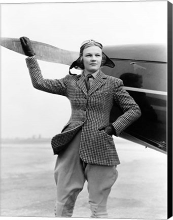 Framed 1930s Woman Aviator Pilot Standing Next To Airplane Print