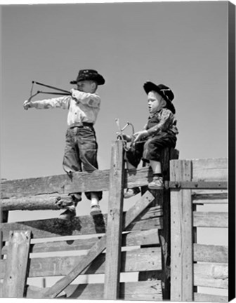 Framed 1950s Two Young Boys Dressed As Cowboys Print