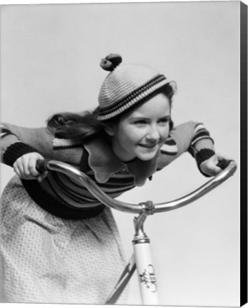 Framed 1930s Smiling Eager Little Girl In Knit Cap And Sweater Riding Bike Print