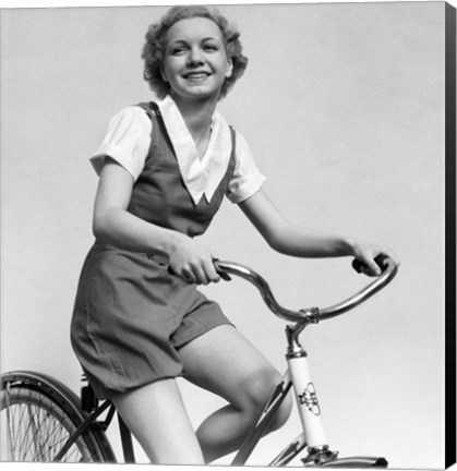 Framed 1930s Smiling Blonde Woman Riding Bicycle Print