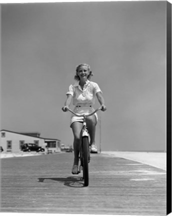 Framed 1940s Summer Time Smiling Woman Riding Bike On Beach Boardwalk Print