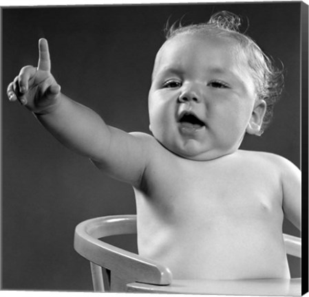 Framed 1940s 1950s Baby Sitting In Chair Arm And One Finger Raised Print