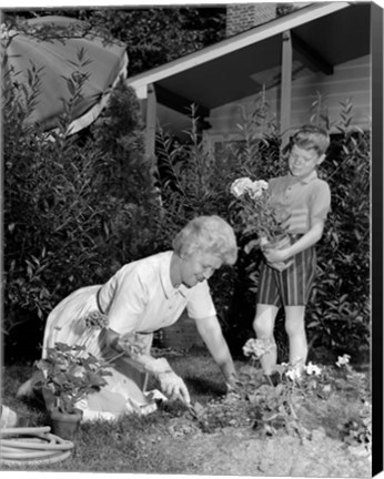 Framed 1960s Boy Helping Grandmother Plant Flowers Print