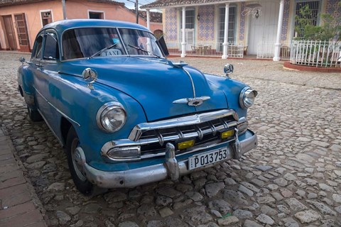 Framed Cuba, Trinidad Blue Taxi Parked On Cobblestones Print