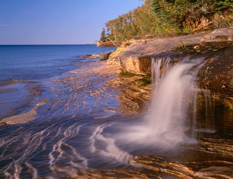 Framed Waterfall Flows Across Sandstone Shore At Miners Beach Print