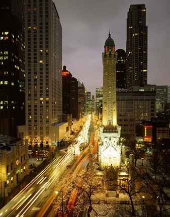 Framed Skyscrapers in a city lit up at night, Chicago, Illinois Print