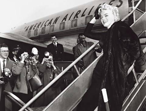 Framed Marilyn Monroe Boards Airplane, New York 1956 Print