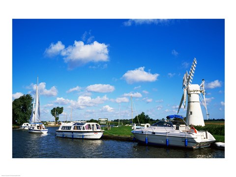 Framed Boats moored near a traditional windmill, River Thurne, Norfolk Broads, Norfolk, England Print