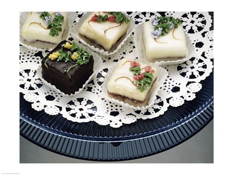 Framed Close-up of assorted cakes on a plate Print