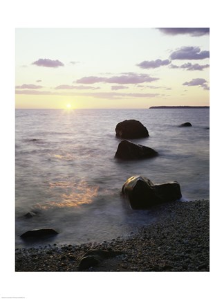 Framed Rocks on the beach at sunrise Print