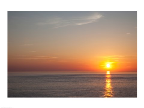 Framed Sunrise over the sea Print