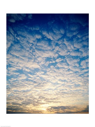 Framed Low angle view of sunrise seen through clouds Print