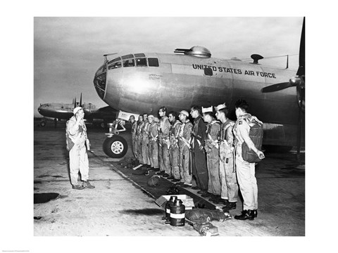 Framed Group of army soldiers standing in a row near a fighter plane, B-29 Superfortress Print