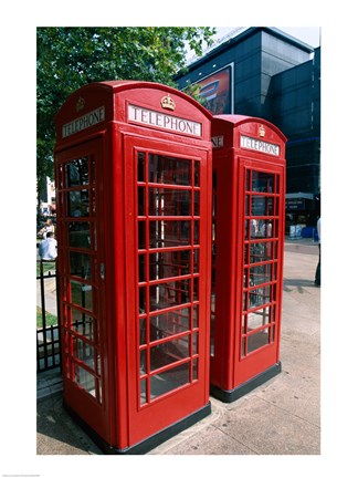 Framed Two telephone booths, London, England Print