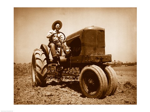 Framed Farmer Plowing a Field with a Tractor Print