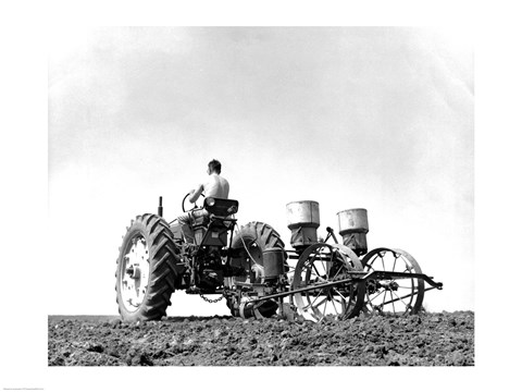 Framed Low Angle View of a Farmer Planting Corn with a Tractor in a Field Print