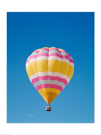 Framed Low angle view of a hot air balloon in the sky, Albuquerque, New Mexico, Yellow &amp; Pink Print