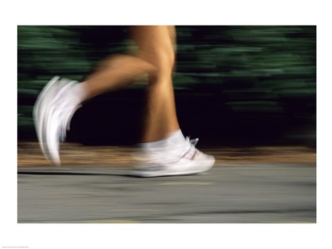 Framed Low Section View Of A Person Running In White Sneakers Print
