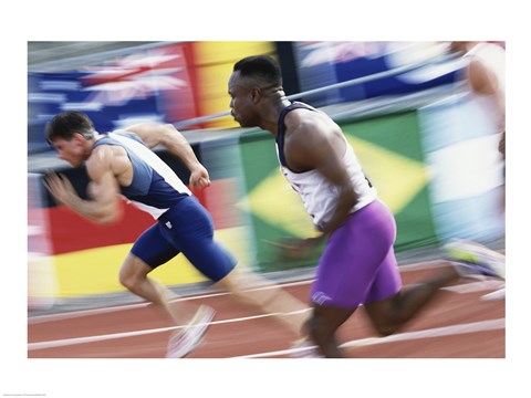 Framed Side profile of two young men running on a running track Print