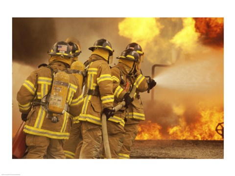 Framed Rear view of a group of firefighters extinguishing a fire and flames Print