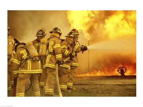Framed Rear view of a group of firefighters extinguishing a fire Print