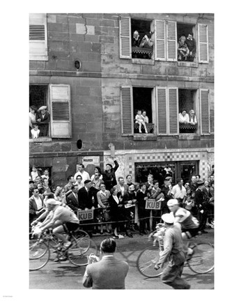 Framed People watching the cyclists being provisioned. Tour de France 1958. Print