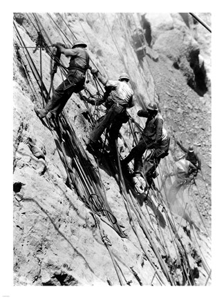 Framed Drillers at work on canyon wall above power plant location Print