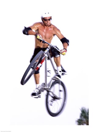 Framed Young man on a bicycle in mid-air Print