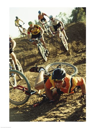 Framed Young man falling off his bicycle in a race Print
