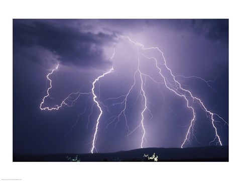 Framed Lightning bolts striking the earth Print