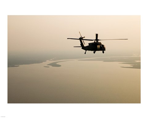 Framed Air Force helicopter flys over Lake Pontchatrain to New Orleans Print