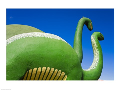 Framed Sculptures of two dinosaurs outside a rock shop, Holbrook, Route 66, Arizona, USA Print