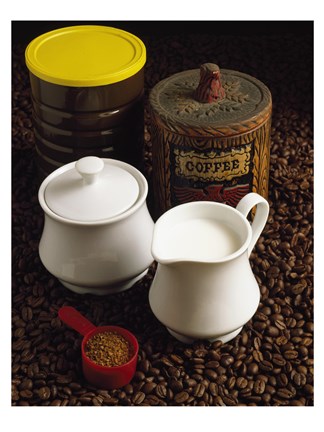 Framed Close-up of a mug of milk with a measuring spoon and jars on coffee beans Print