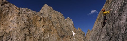 Framed Man climbing up a mountain, Grand Teton, Grand Teton National Park, Wyoming, USA Print