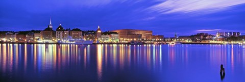 Framed Buildings at the waterfront lit up at dusk, Stockholm, Sweden Print