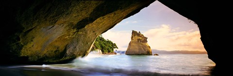 Framed Rock formations in the Pacific Ocean, Cathedral Cove, Coromandel, East Coast, North Island, New Zealand Print