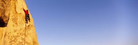Framed Rear view of a woman climbing a mountain, Joshua Tree National Park, California, USA Print
