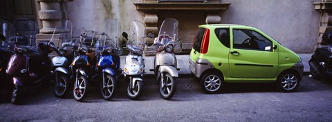 Framed Motor scooters with a car parked in a street, Florence, Italy Print