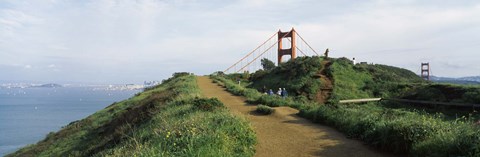 Framed Path leading towards a suspension bridge, Golden Gate Bridge, San Francisco, California, USA Print