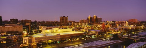 Framed High angle view of buildings lit up at dusk, Kansas City, Missouri, USA Print