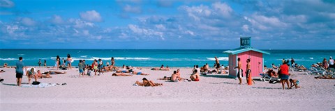 Framed Tourist on the beach, Miami, Florida, USA Print