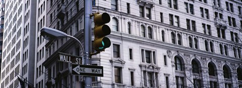 Framed Low angle view of a Green traffic light in front of a building, Wall Street, New York City Print